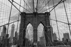 Brooklyn Bridge with city skyline view.