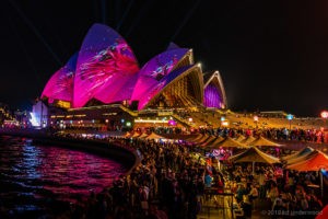 Sydney Opera House illuminated during night festival.